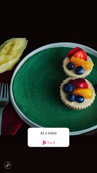 a plate with fruit and a fork on it